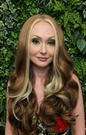 Karzima in Cinnamon Swirl | 26" Reddish Brown Wavy Lace Front Wig